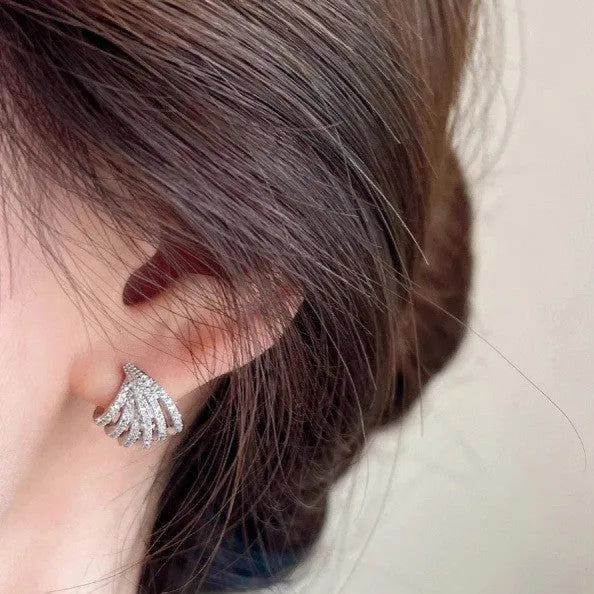 Women's geometric line design earrings with platinum electroplated finish on zircon material