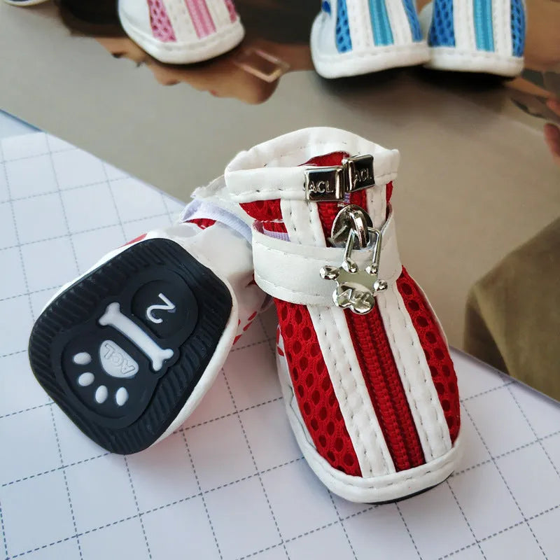 Blue zipper closure cloth dog shoes with non-slip soles for small breeds.