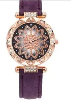Women's fashion watch with diamond bezel, round 32mm dial, available in multiple colours on a pin buckle strap.