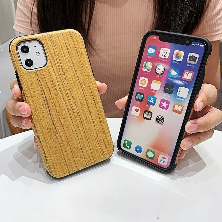 Wooden iPhone back cover case in rosewood finish showing precise cutouts for camera and ports.