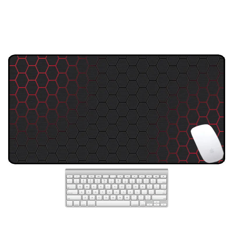 Large natural rubber desk mouse pad with a printed geometric pattern, showing non-slip base.