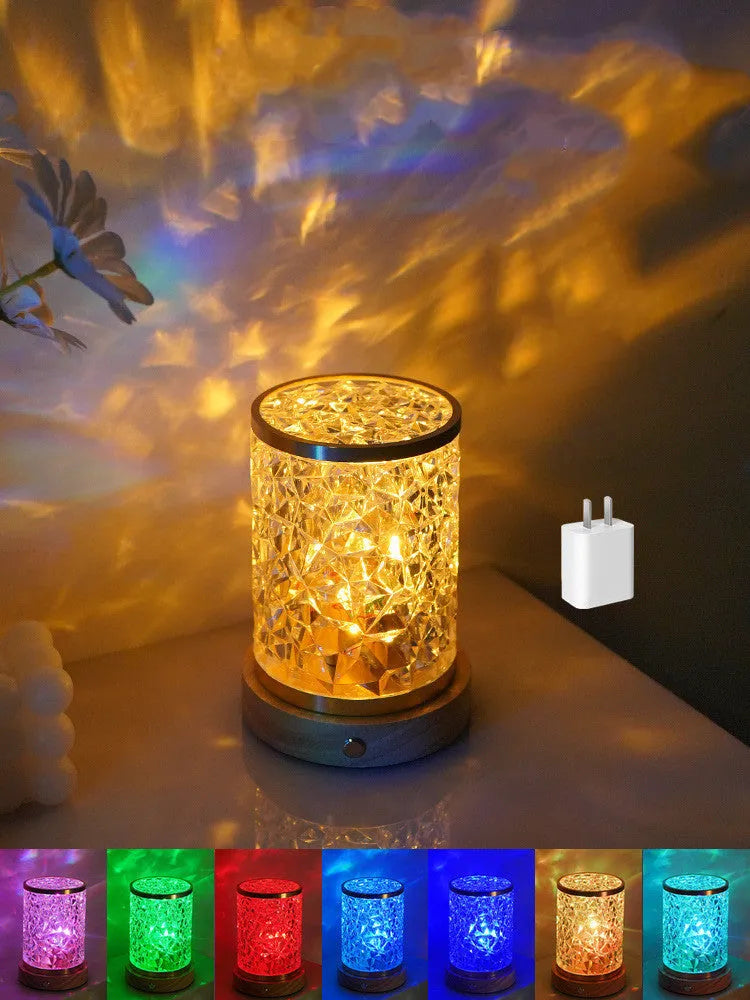 Small rotating water ripple night light with acrylic shade on solid wood base
