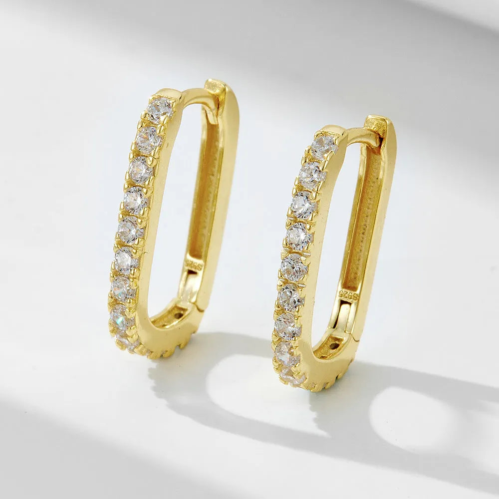 Sterling silver oval zircon ear clips with geometric quadrilateral settings
