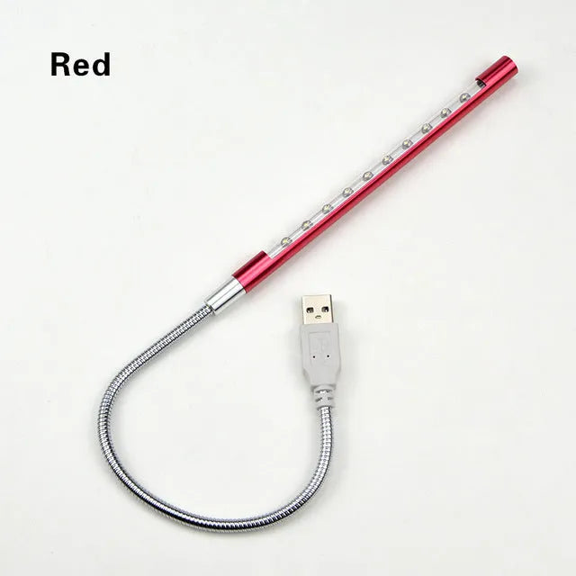 Spiral-shaped USB LED night light in metallic finish with aluminium alloy shade and metal base.
