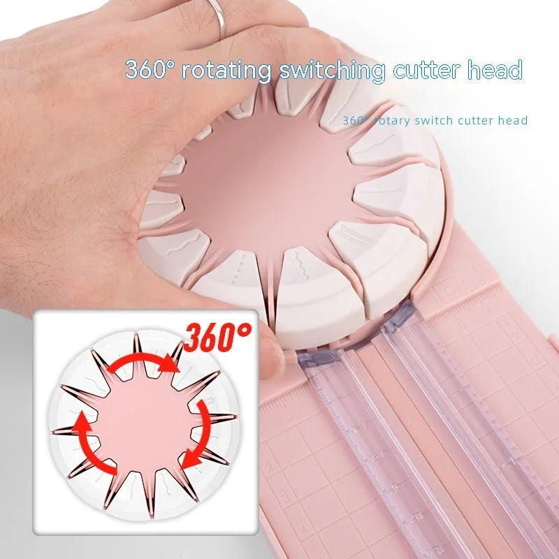 Pink and black plastic paper cutting machine with 12 patterns on desktop