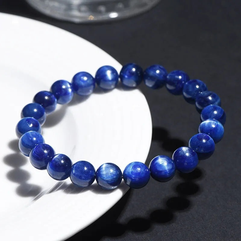 Natural blue crystal ball bracelet with geometric Ruyi design in polished grade 7A crystal