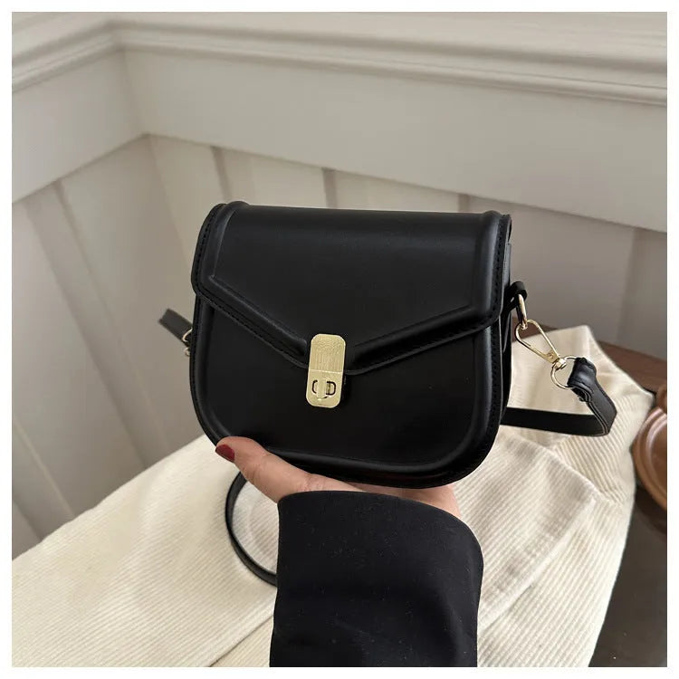 Niche textured PU shoulder messenger bag in soft horizontal square clamshell design