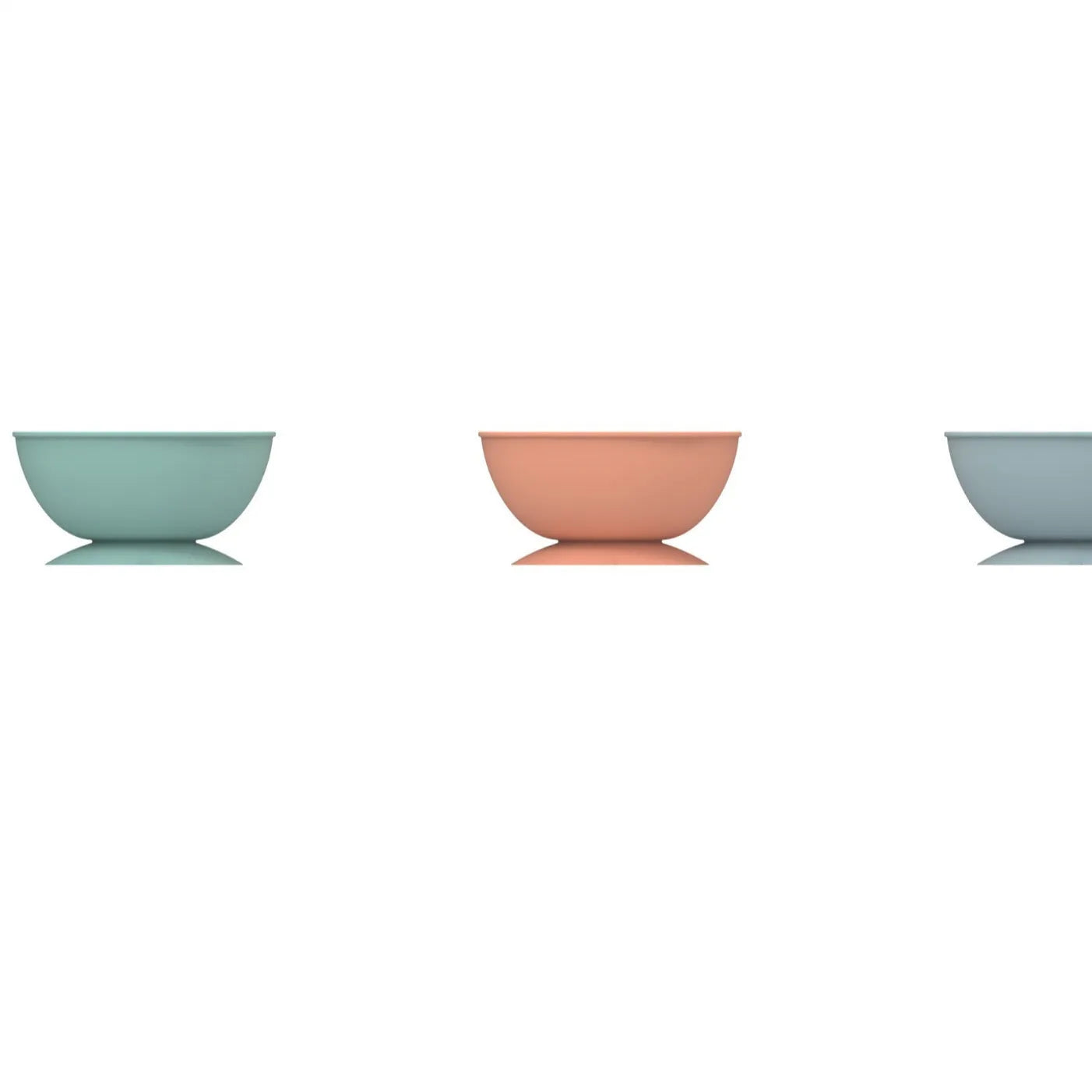 Cyan silicone dog bowl with licking mat texture and suction cup base on a floor.