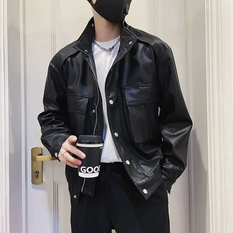 Men's black Korean style pilot leather jacket with side seam pockets on a hanger.