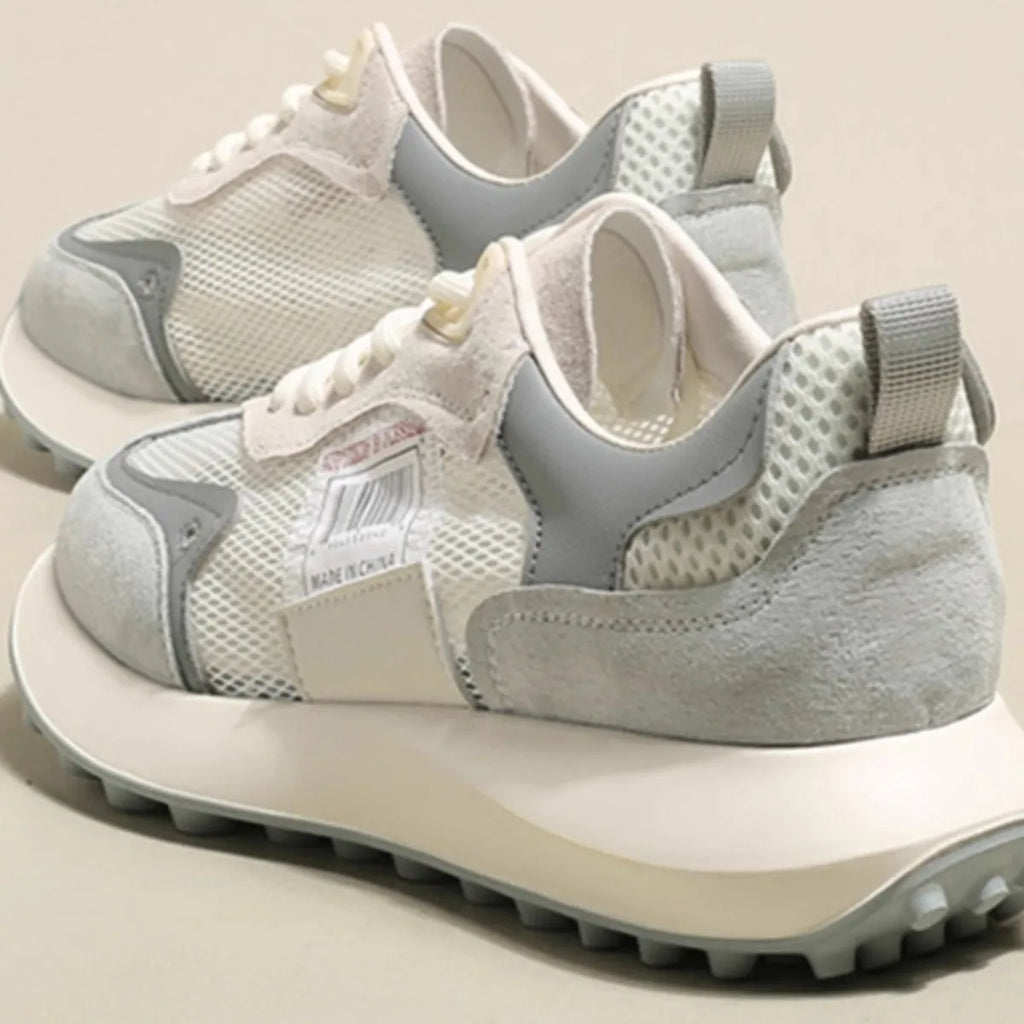 Women's grey and pink retro low-top sneaker with round toe and rubber sole
