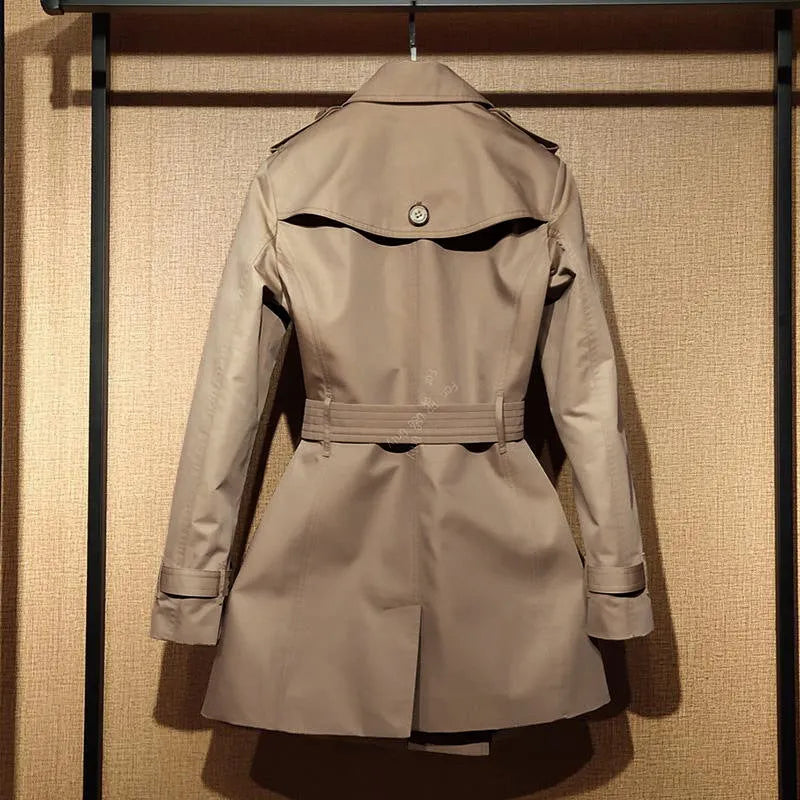 Khaki women's double-breasted trench coat with long flight sleeves, button front.