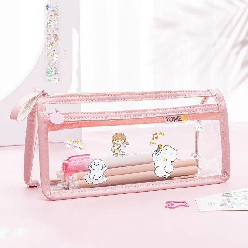 Transparent double-layer pencil case showing two compartments with writing instruments inside, dimensions 220x110x80mm