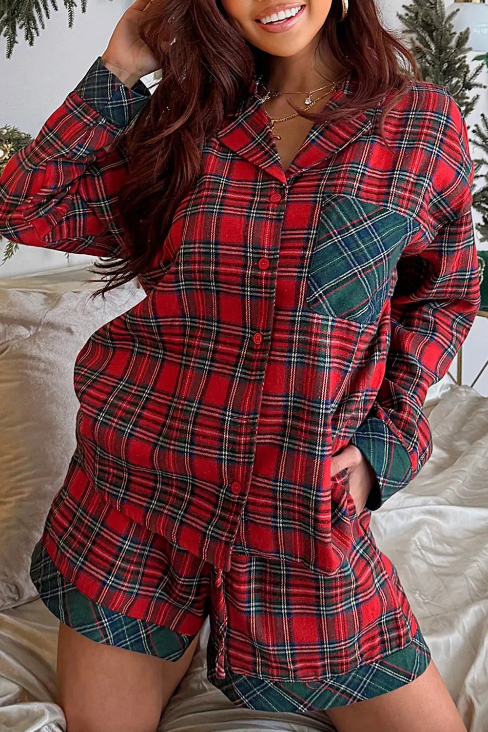Red plaid Christmas holiday long sleeve shirt and shorts two-piece pajama set.