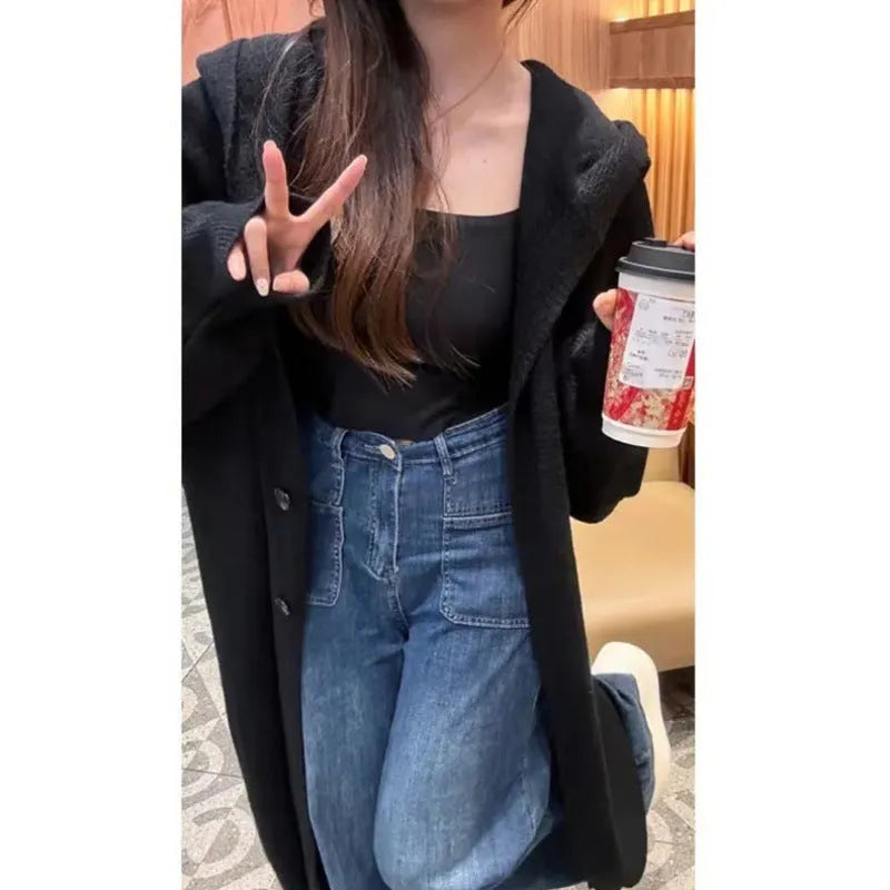 Korean style long hooded knitted cardigan coat for women in a loose free size.