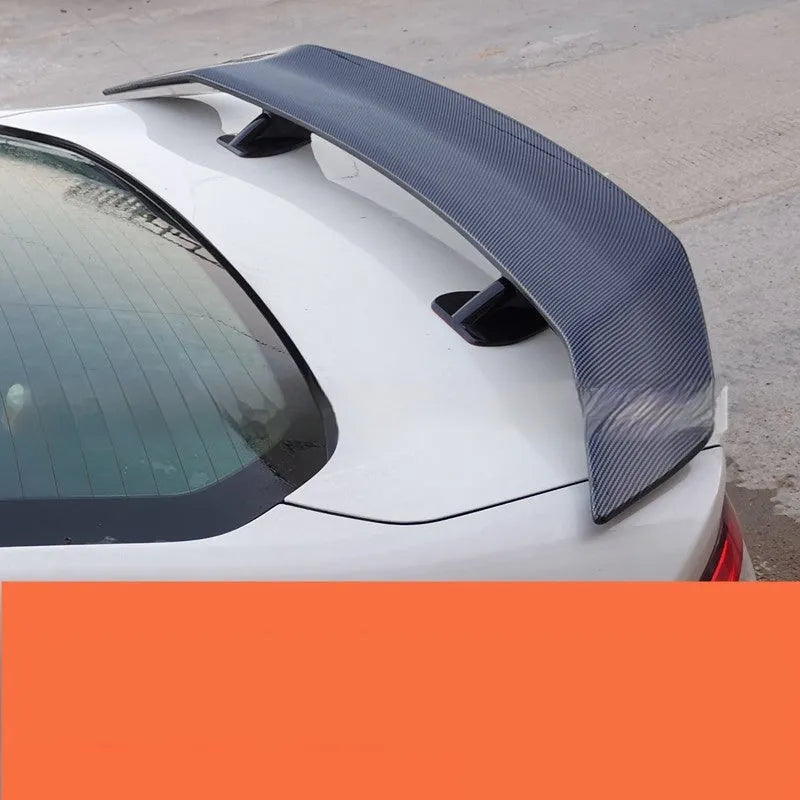 Universal punch-free car spoiler in ABS plastic with adhesive mounting