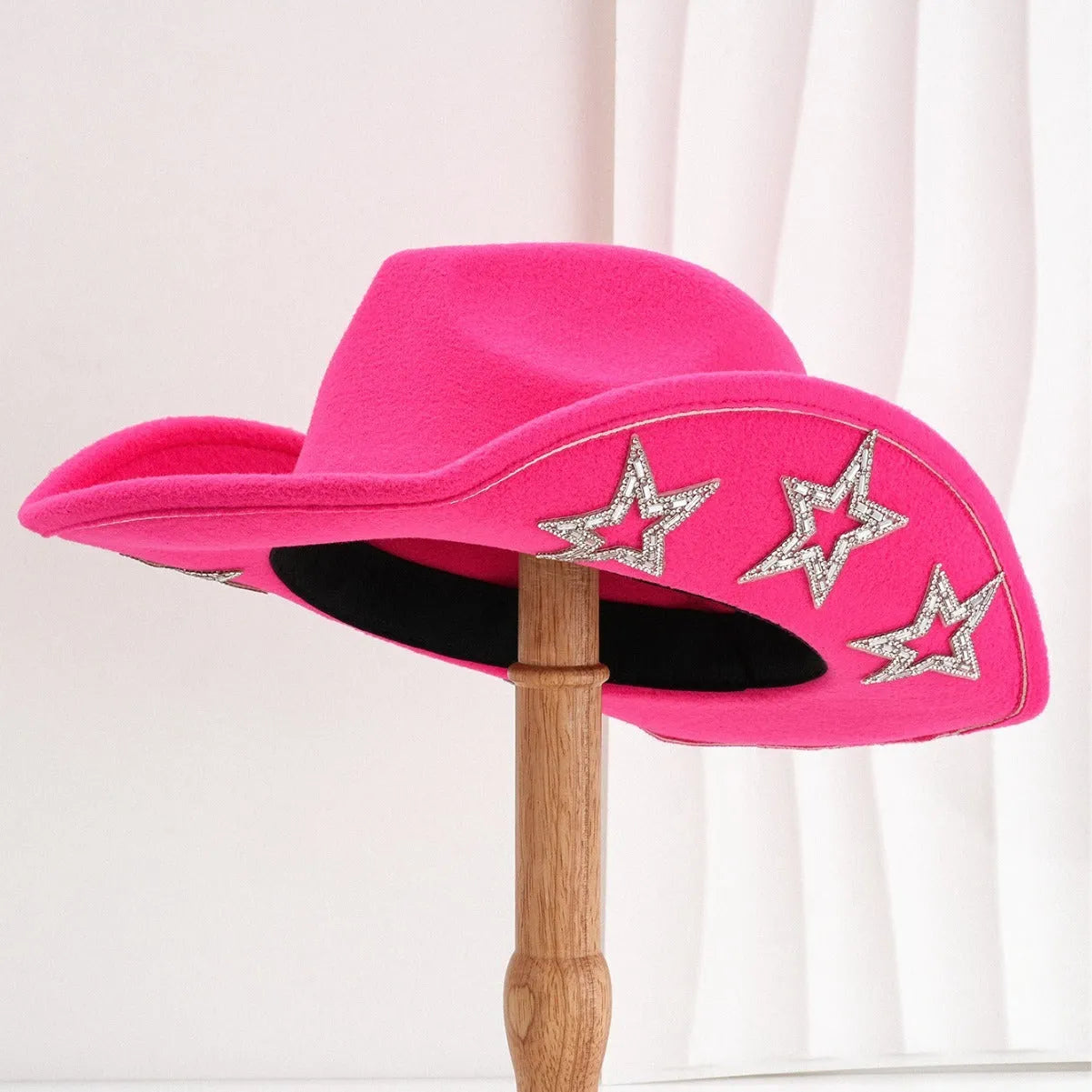 Brown polyester western-style top hat with a conical crown and a silver hexagonal star decoration on the front.