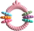 TPR dog chew toy for small dogs in blue, green, or pink colours with squeaky sound feature