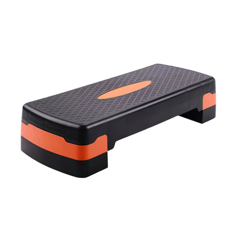 Grey ABS plastic aerobic step platform measuring 68x28x15cm for home fitness and yoga exercises.