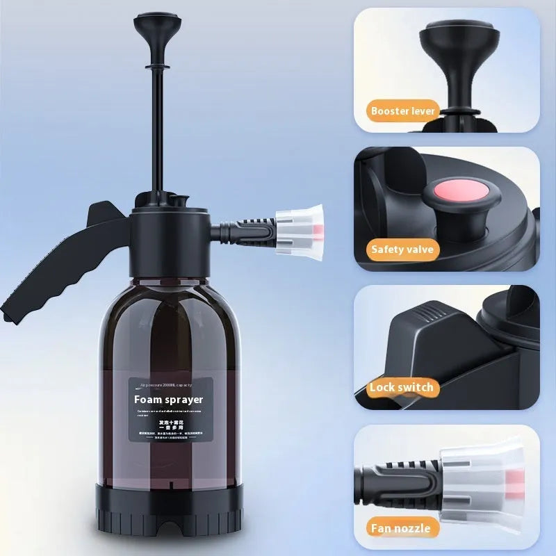 Black plastic 2-litre foam watering can sprayer with handle and spray nozzle.