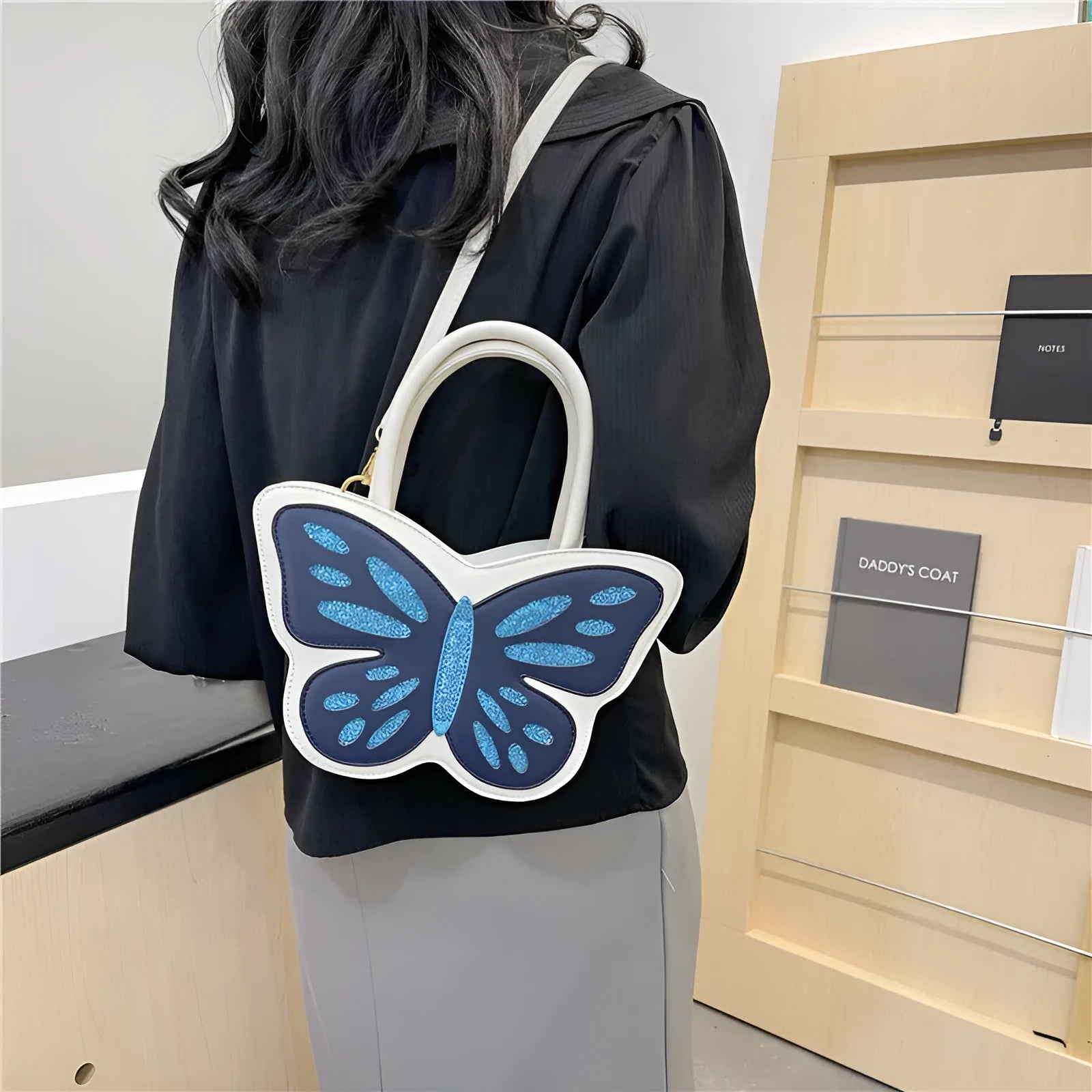 Square crossbody bag in white, pink, blue, or black with contrast colour detailing