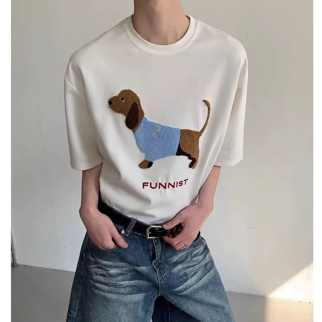 Gray men's T-shirt with an embroidered textured sausage dog design on the front.