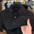 Men's black Rhombus short sleeve T-shirt with a slit hem detail, made from a thin chemical fibre blend fabric.