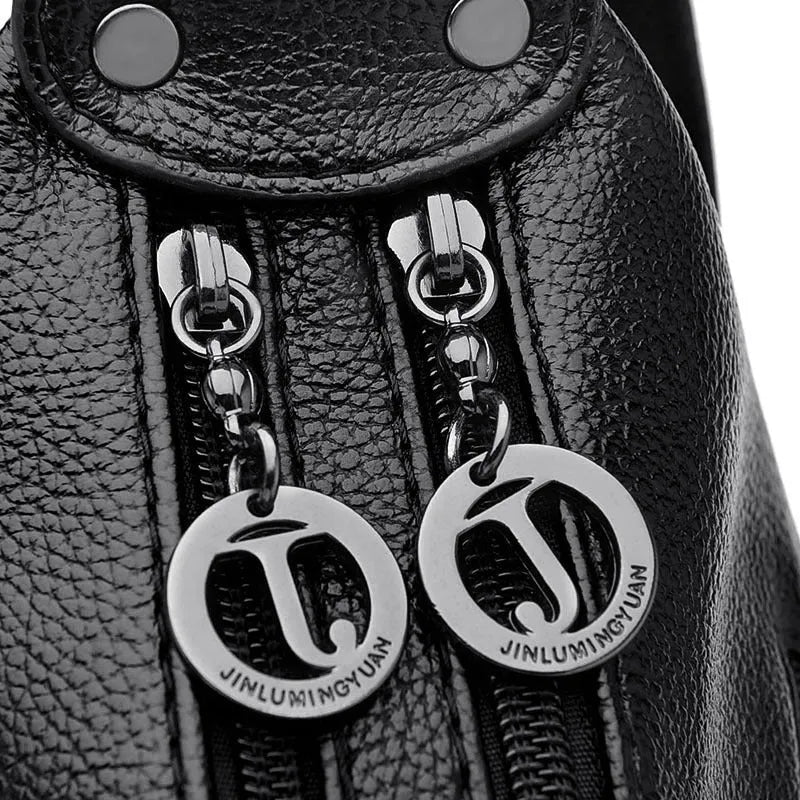 Women's blue soft PU crossbody bag showing interior phone and document compartments with zipper closure