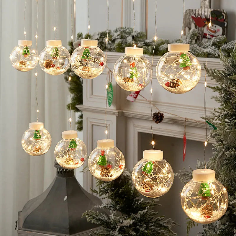 LED Christmas curtain light string with 10 decorative PVC lamp balls showing fairy, snowman, and wishing ball designs.