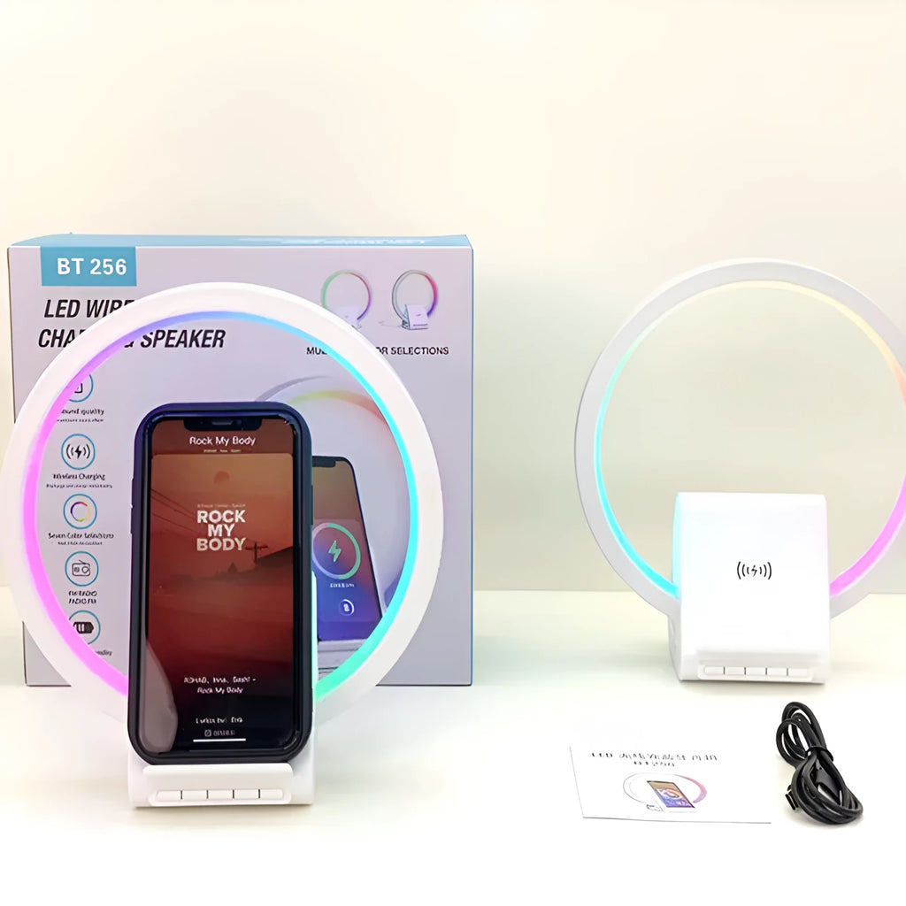 White smart Bluetooth speaker with ambient light ring and wireless charging surface