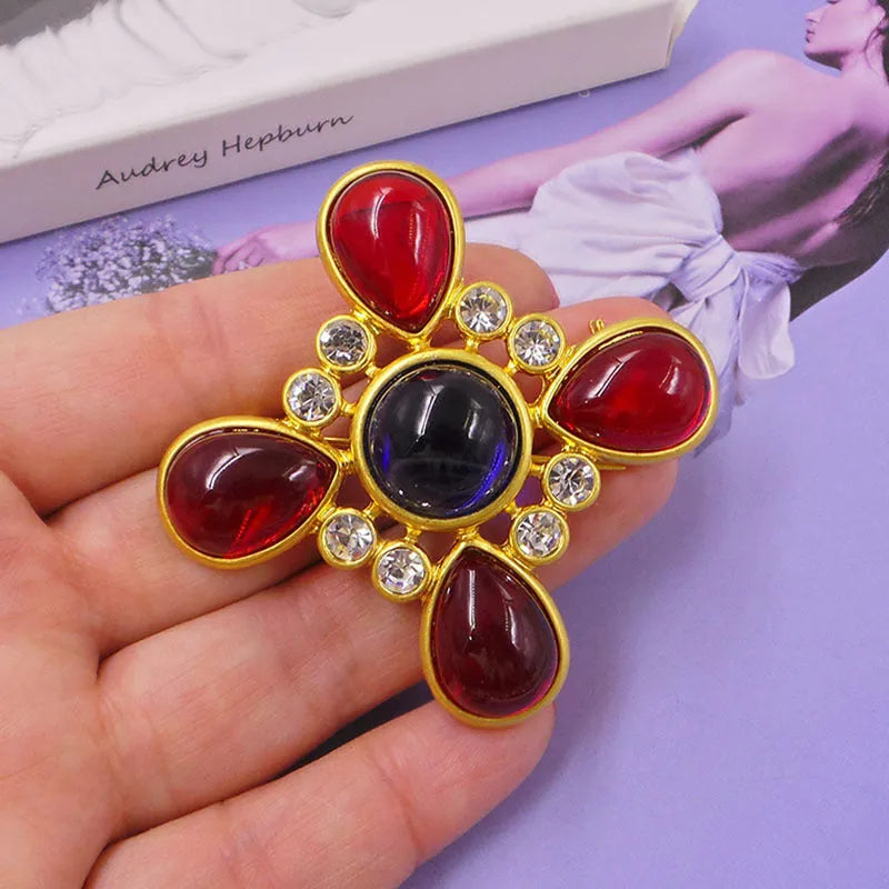 Close-up of a vintage zinc alloy baroque cross brooch with crystals, showing one of eight available colour styles.