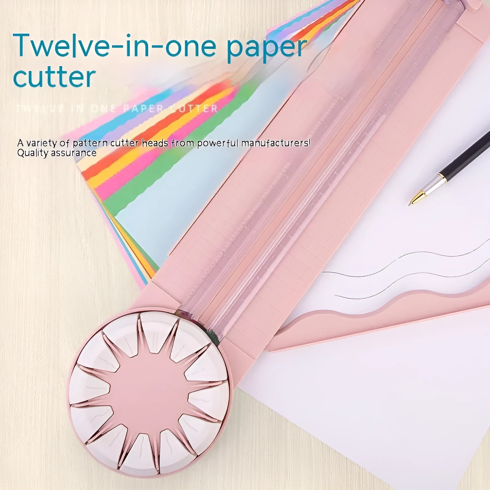 Pink and black plastic paper cutting machine with 12 patterns on desktop