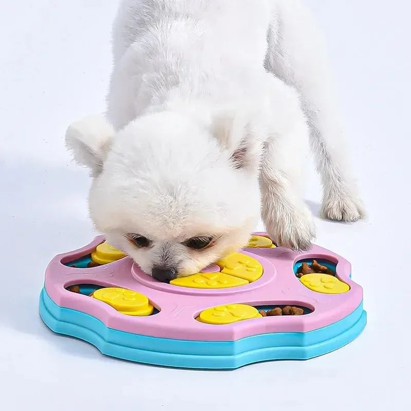 Blue and pink dog puzzle feeder toy with food compartments for interactive play and slow feeding