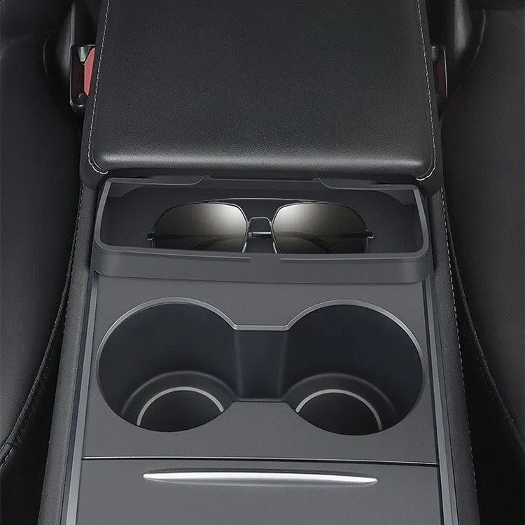 Black silicone glasses case mounted on Tesla Model 3 centre console