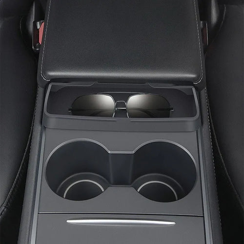 Black silicone glasses case mounted on Tesla Model 3 centre console