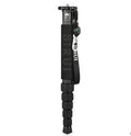 Black carbon fibre monopod for SLR cameras extended to maximum height showing 6 sections