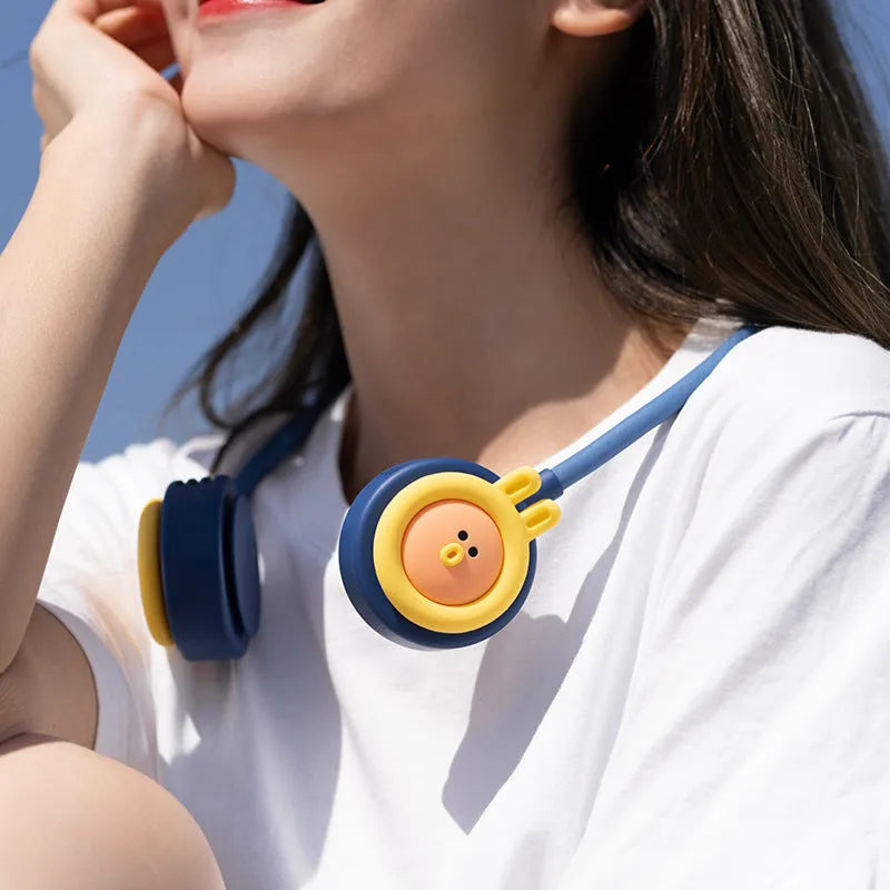 Pink folding leafless neck fan worn around neck showing three-speed controls and USB charging port