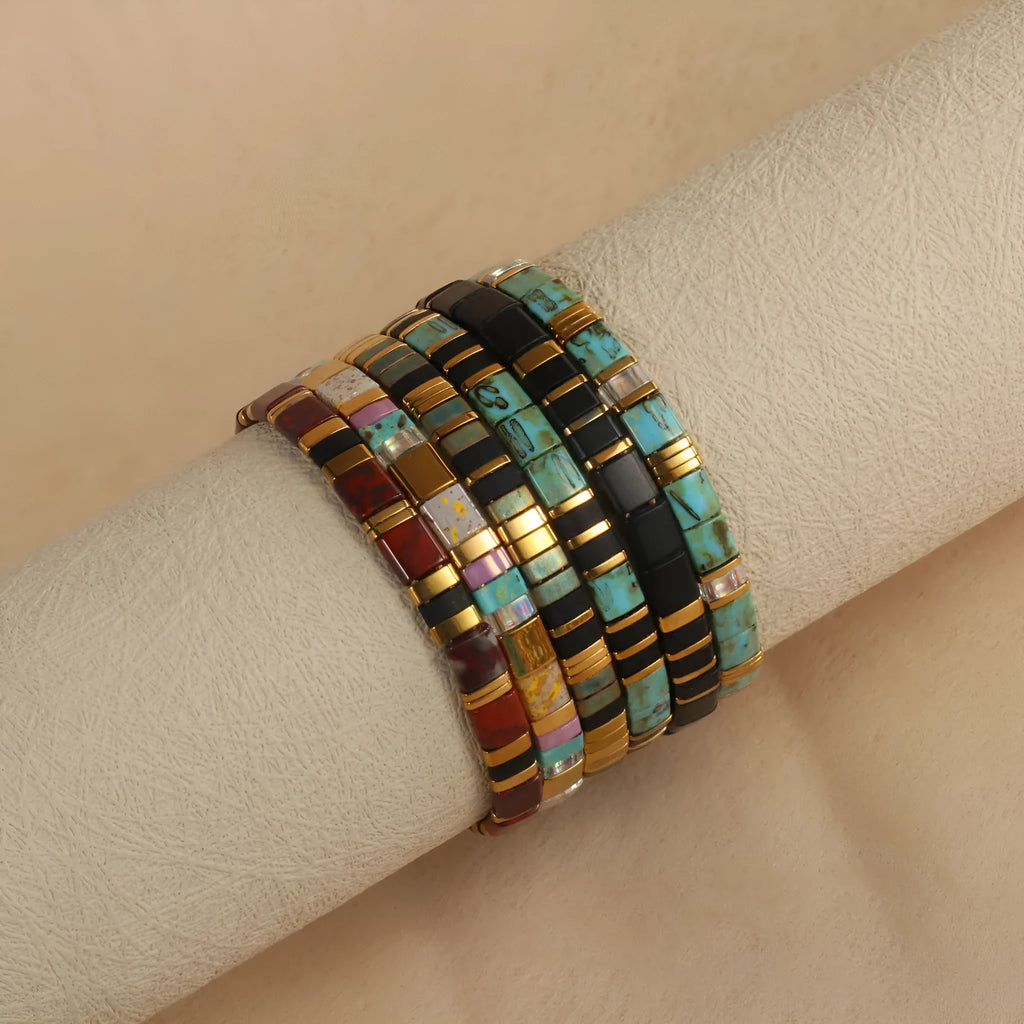 Geometric glass and coloured glaze bead bracelet in milky white, black, green, blue, or red