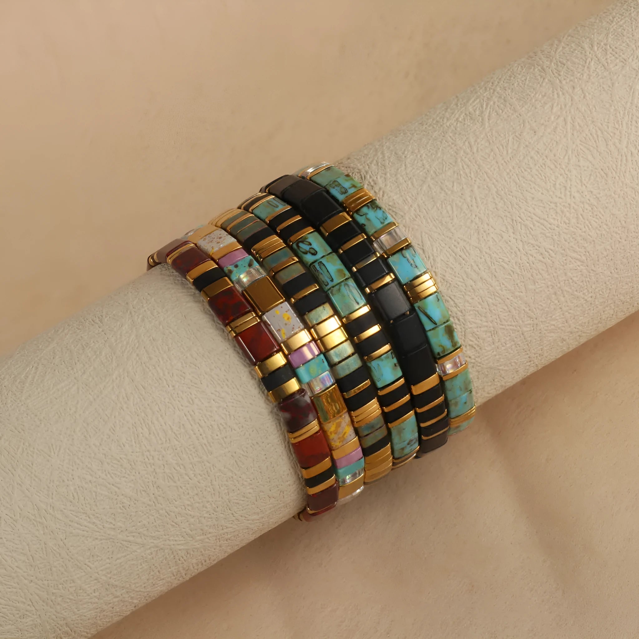 Geometric glass and coloured glaze bead bracelet in milky white, black, green, blue, or red
