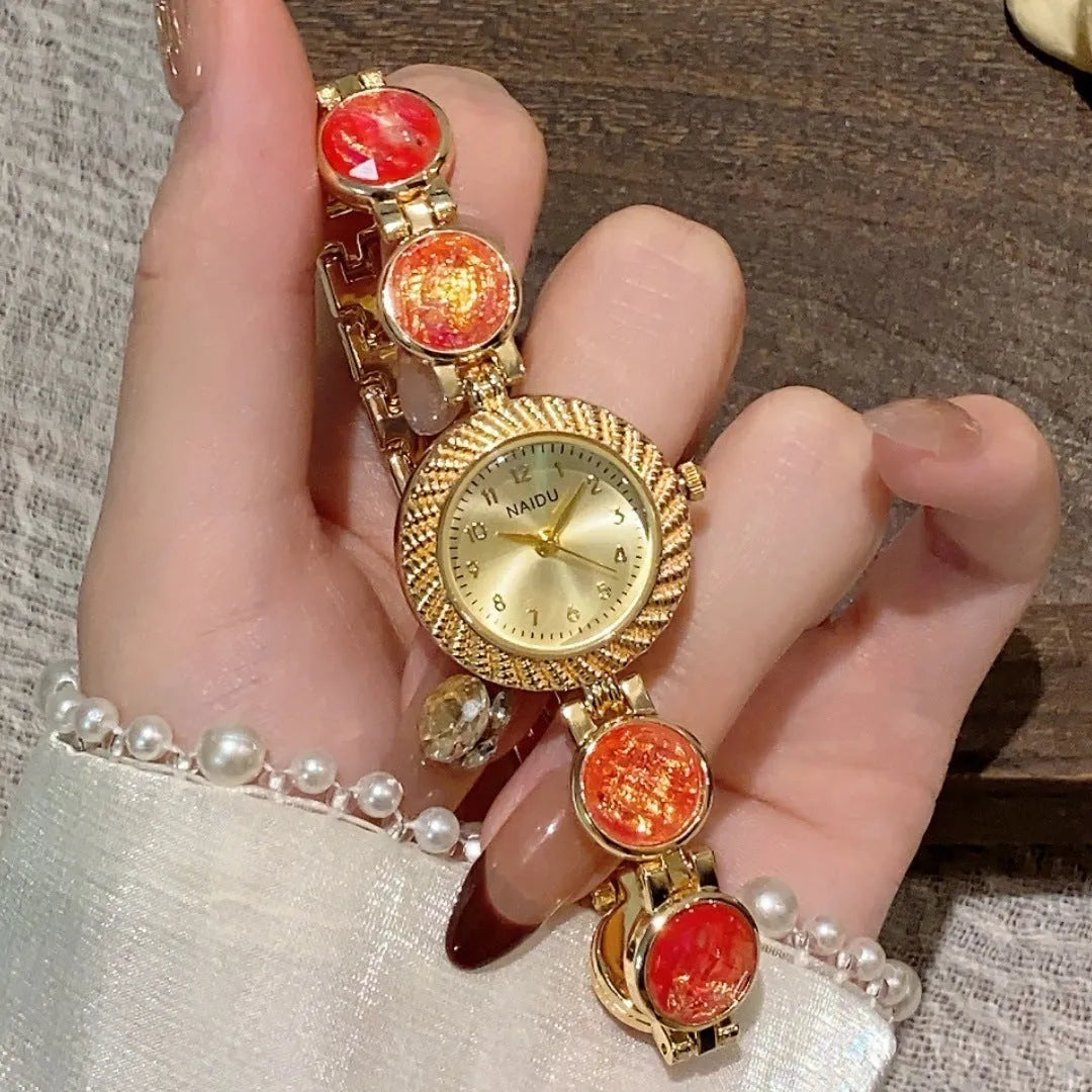 Women's quartz watch with 25mm round dial in choice of six colours on wrist.