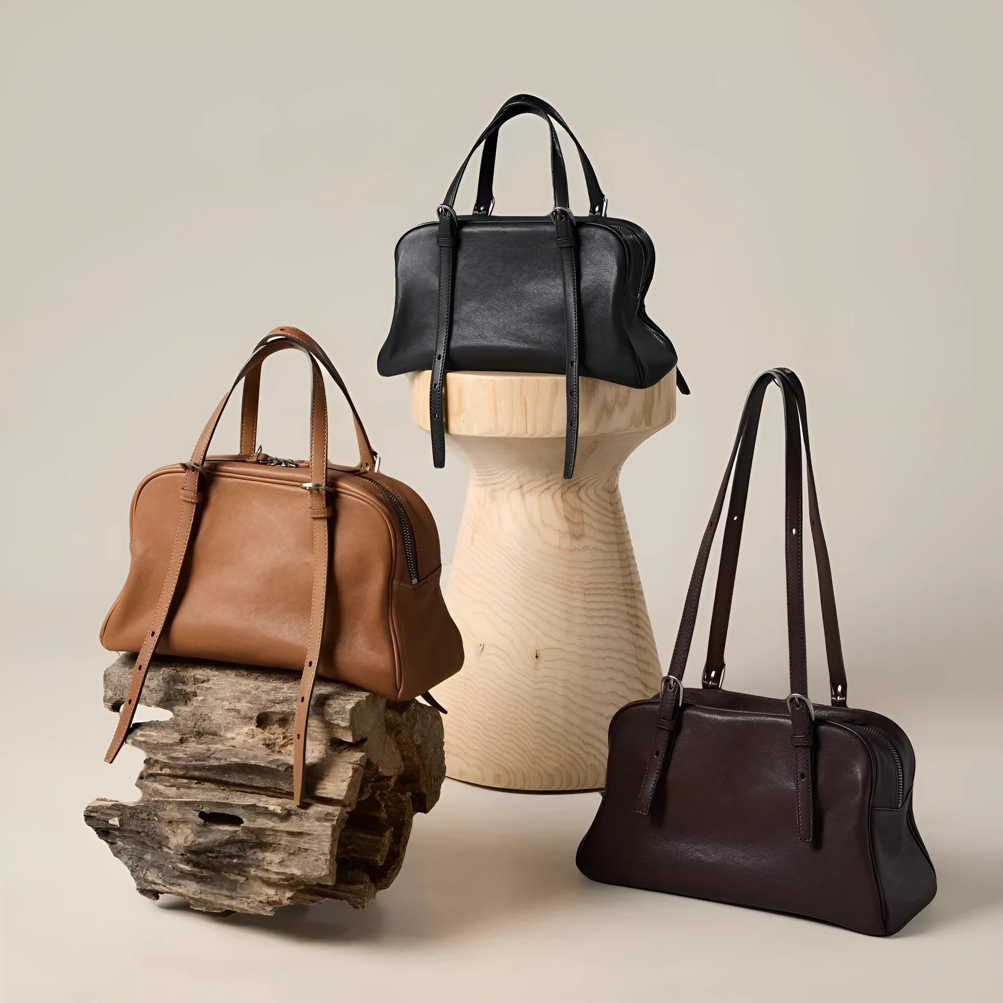 Women's genuine leather retro shoulder bag showing horizontal square design with double straps in black colour option.