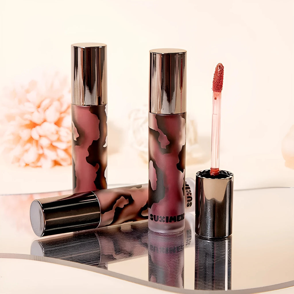 Lava Secret Matte Lip Mud Lipstick tube in one of five colours: orange brown coffee, cool grey, cinnamon coffee, jujube red, or smoked purple.
