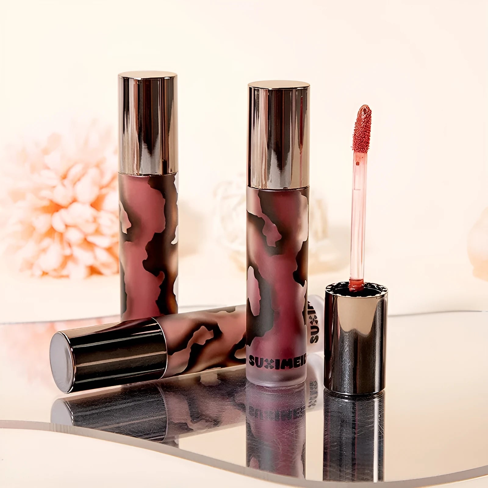 Lava Secret Matte Lip Mud Lipstick tube in one of five colours: orange brown coffee, cool grey, cinnamon coffee, jujube red, or smoked purple.