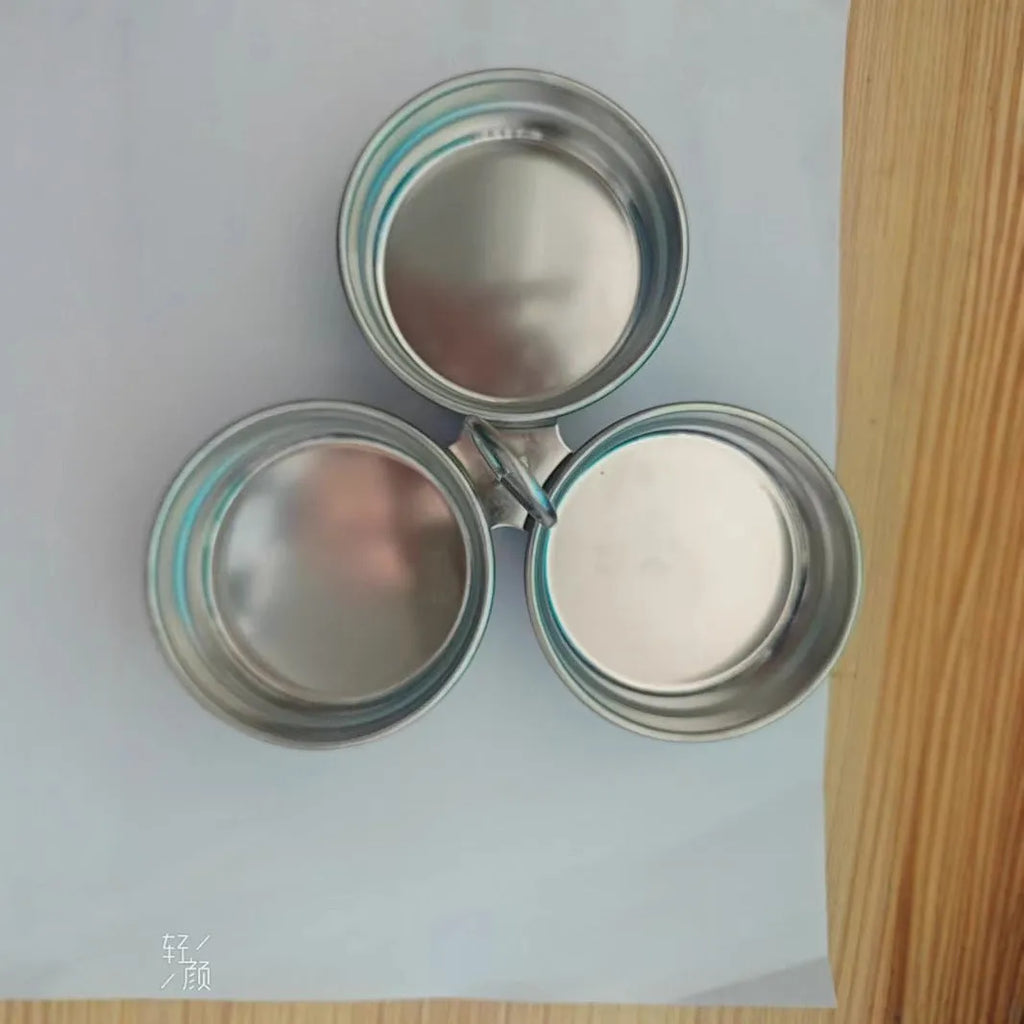 Heart-shaped stainless steel mini egg steamer for cooking individual eggs on stovetop
