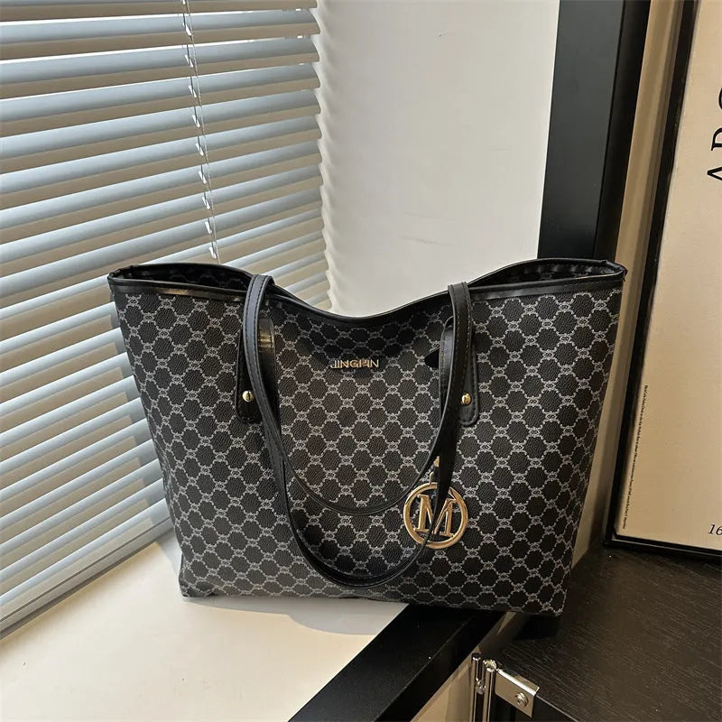 Western style PU leather shoulder bag showing sewing thread detailing, 42cm wide by 28cm tall, available in black, grey, white, and brown colours