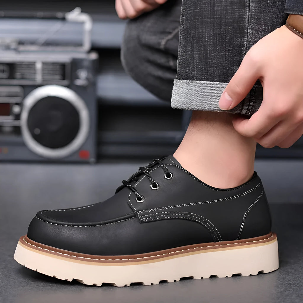 Men's black retro Martin-style low-top boots with round toe and non-slip rubber sole.