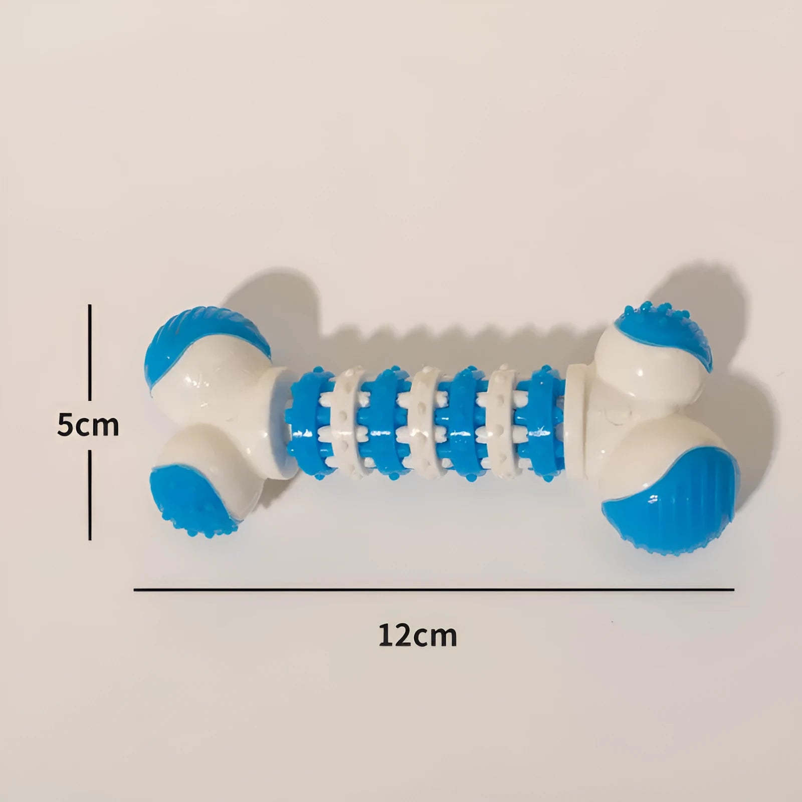 Small dog bone chew toy with treat dispenser centre in blue, orange and red colours