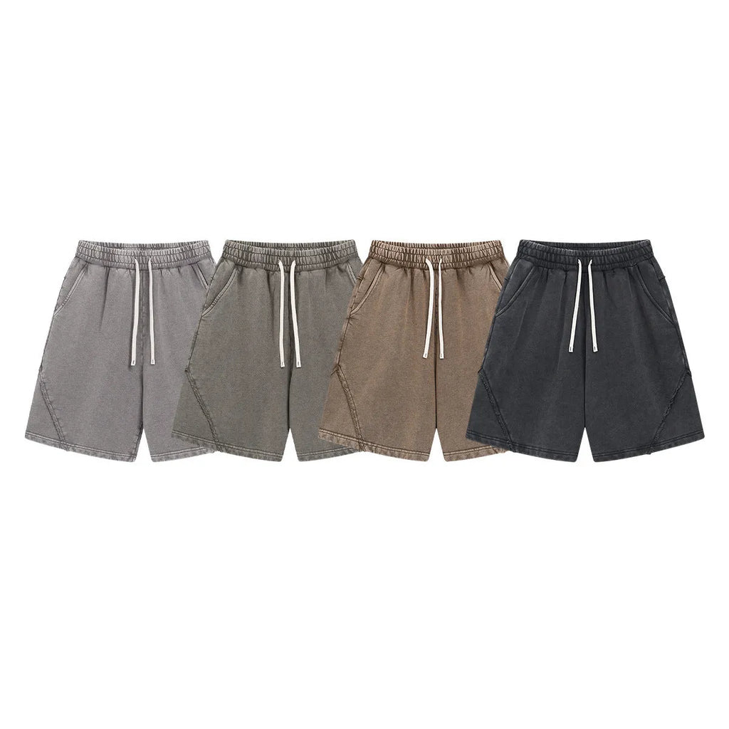 Men's loose-fit pure cotton terry shorts in a batik grey colour, showing street fashion style.