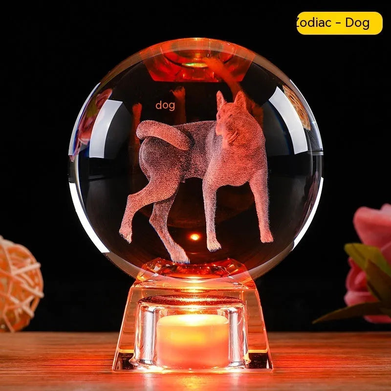 Chinese zodiac crystal ball lamp with electronic charging base showing animal design