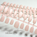 Set of frosted velvet Cat's Eye false nail wraps in short ladder sizes XS, S, and M on a display stand.