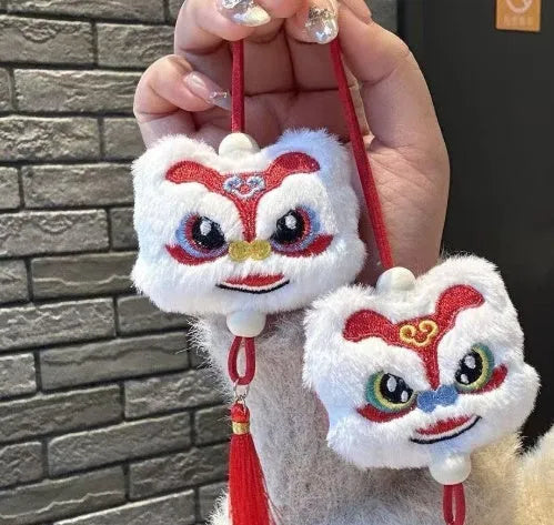 Chinese style plush lion keychain ornament with star stone details in blue or yellow colour